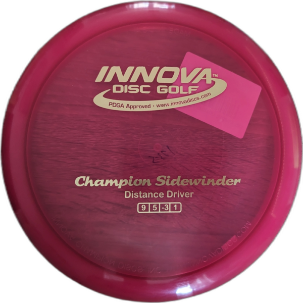 Champion Sidewinder from Innova. Colour is Maroon with a Golden stamp.
