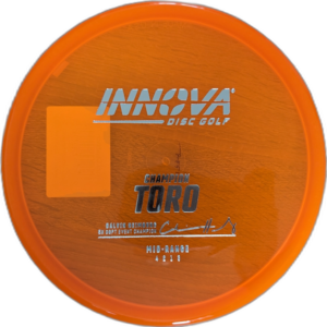 Champion Toro from Innova. Colour is Orange with a Silver stamp.