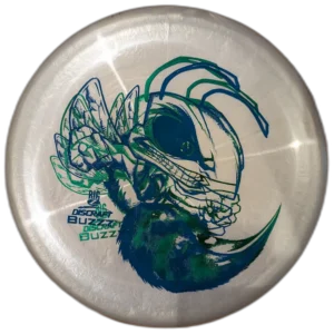Big Z Buzzz from Discraft. Double stamped, Pearly white/silver with a blue/green stamp.